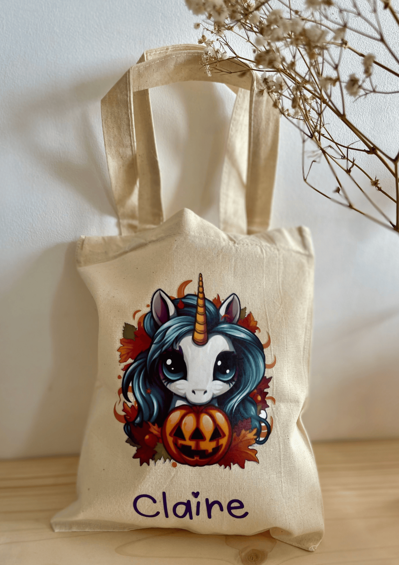 sac en toile de jute pour la chasse aux bonbon pour Halloween avec une licorne